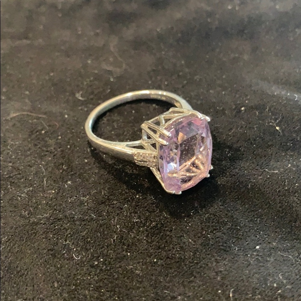 Purple gemstone solitaire ring